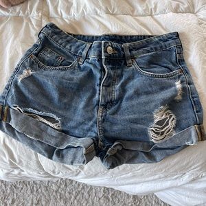 Blue denim shorts.